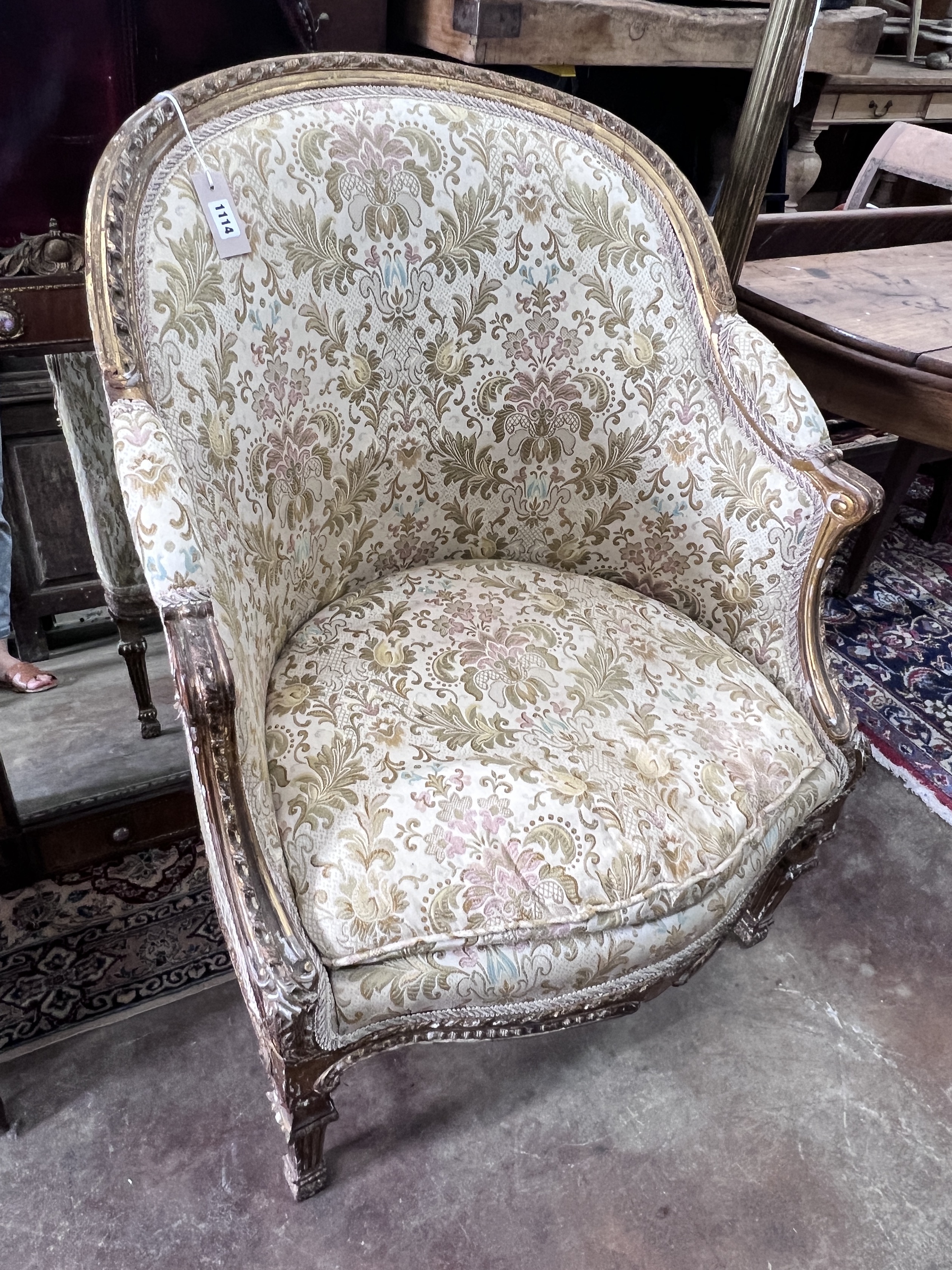 A 19th century French giltwood tub framed chair, width 71cm, depth 55cm, height 96cm